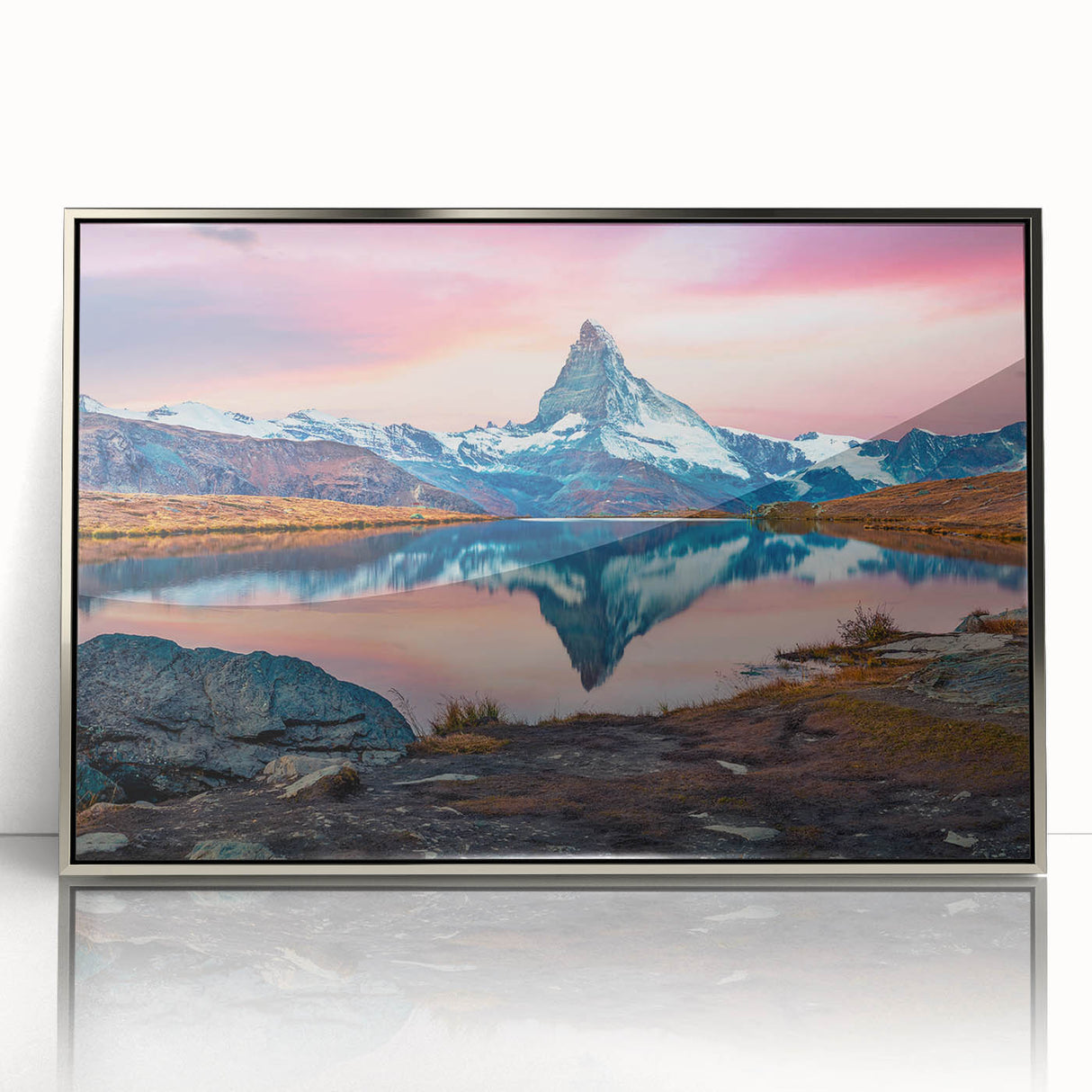Framed wall art featuring a stunning mountain landscape design with vibrant colors and intricate details, set in a sleek silver frame, ideal for home decor.