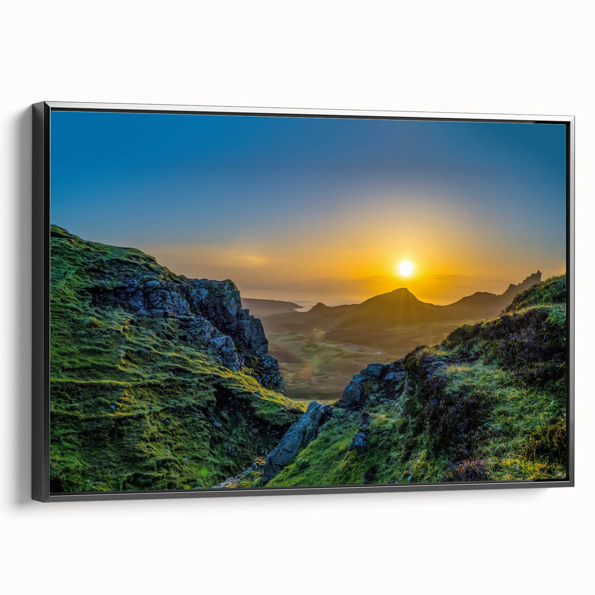 Framed canvas wall art showcasing a stunning mountain landscape design with rich colors and intricate details, presented in a sleek black frame for an elegant touch.