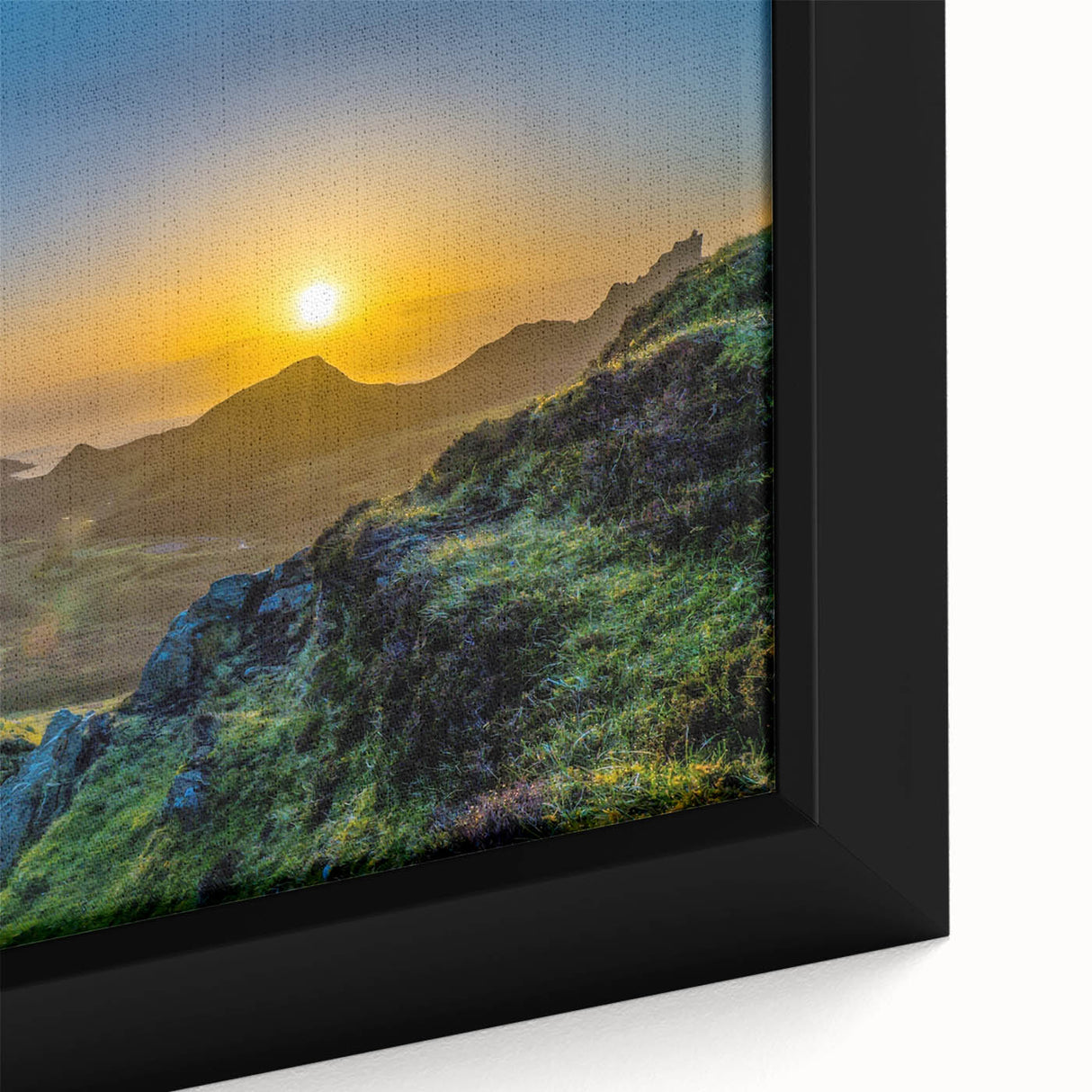 Framed canvas artwork showcasing a vibrant mountain landscape design, featuring rich colors and intricate details, perfect for home decor.