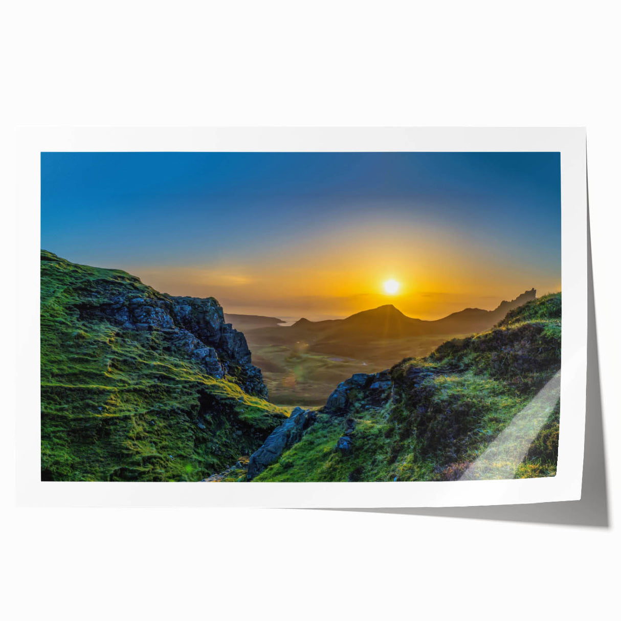 Stunning rolled print of a vibrant mountain landscape featuring dramatic peaks under a clear blue sky, perfect for home decor or office spaces.