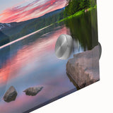 Close-up of a vibrant acrylic glass wall art piece featuring a stunning mountain landscape design, showcasing rich colors and intricate details, perfect for home decor.