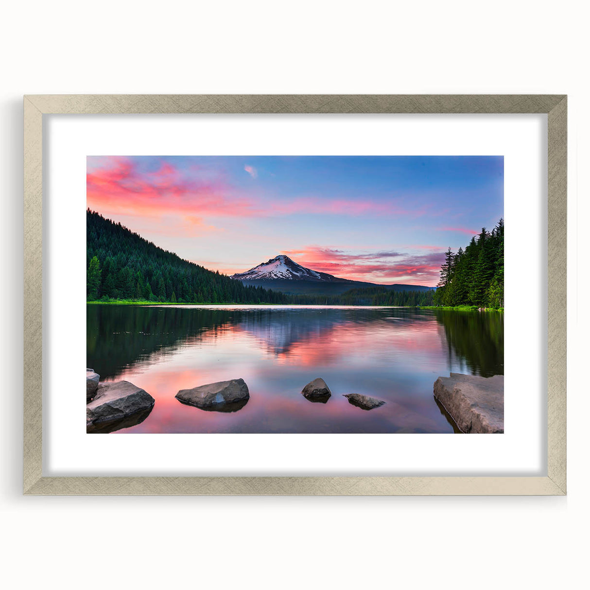 Framed wall art showcasing a serene mountain landscape design in silver, featuring a white mat for an elegant presentation, ideal for home decor.