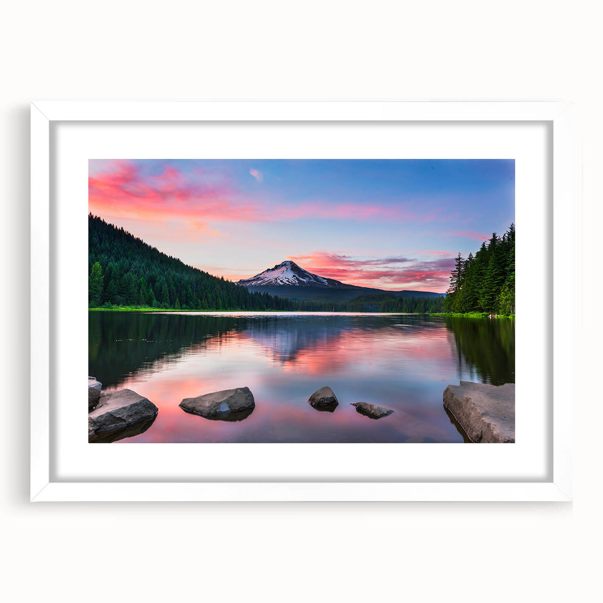 Framed wall art featuring a serene mountain landscape in soft pastel colors, set in a white mat and frame, perfect for home decor or office aesthetics.