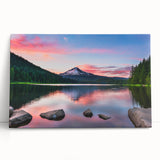 Stretched canvas wall art showcasing a serene mountain landscape, featuring soft blue and green hues with a textured finish, perfect for home decor.