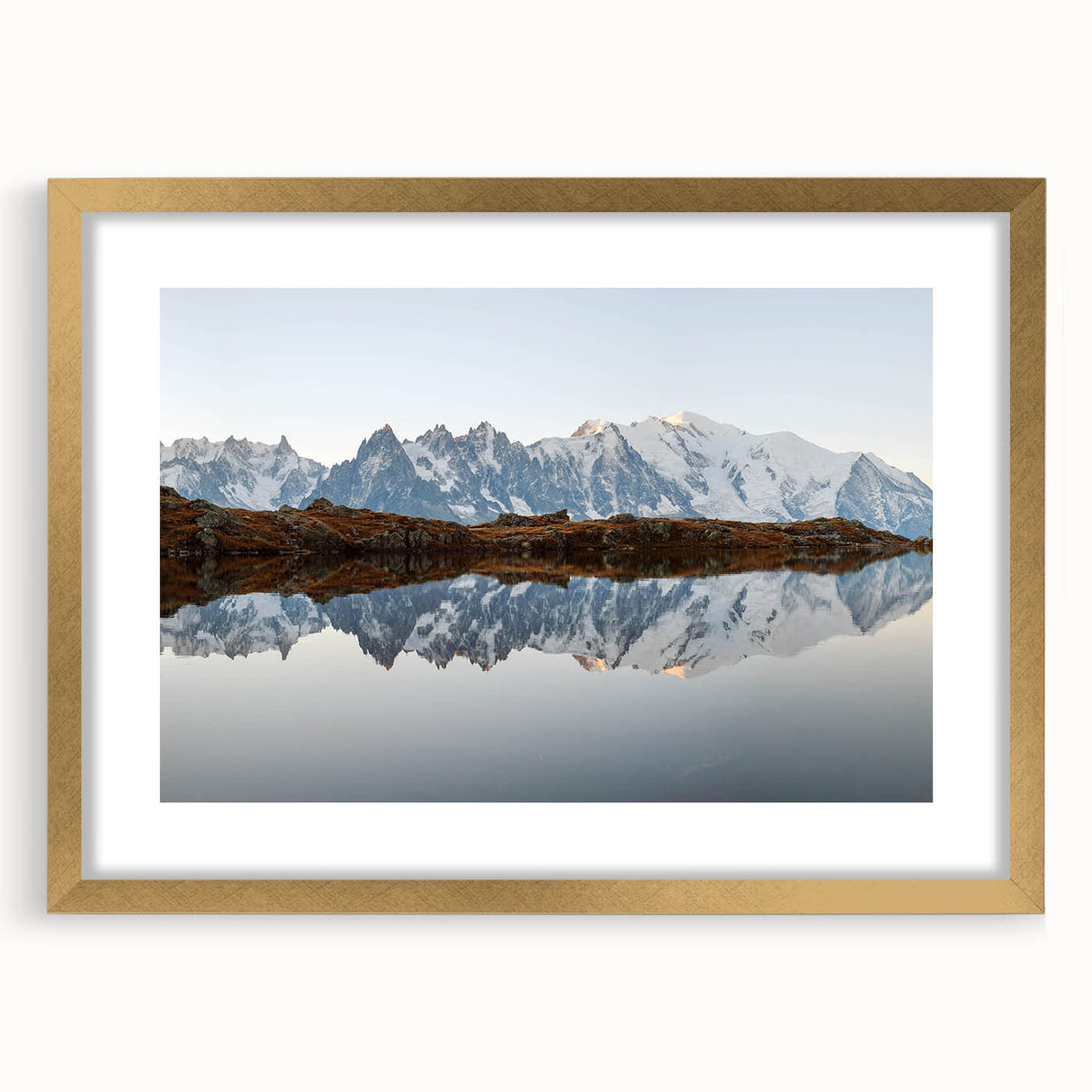 Framed wall art showcasing a stunning mountain landscape design with a gold mat, perfect for home decor. Ideal for nature lovers seeking elegant wall accents.
