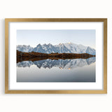 Framed wall art showcasing a stunning mountain landscape design with a gold mat, perfect for home decor. Ideal for nature lovers seeking elegant wall accents.