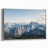Framed canvas wall art showcasing a serene mountain landscape design with vibrant colors and silver accents, perfect for enhancing modern decor in living spaces.