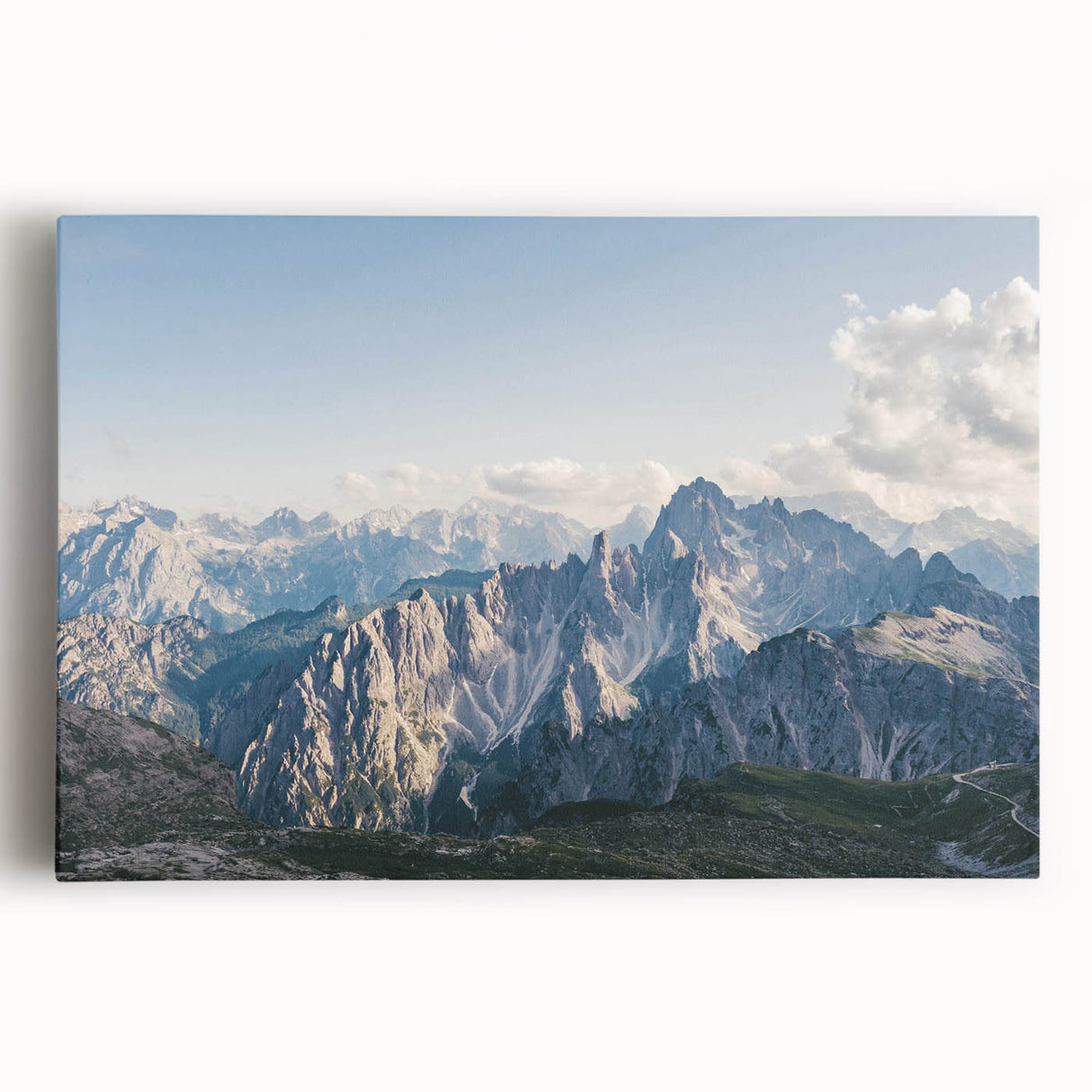 Stretched canvas wall art showcasing a stunning mountain landscape design, featuring vibrant blues and greens, ideal for modern home decor and nature enthusiasts.