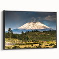 Framed wall art showcasing a serene mountain landscape in muted tones, featuring a black frame and side view display, perfect for home decor enhancement.
