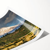 Vibrant landscape wall art print showcasing majestic mountains and a serene sky, rolled and ready for framing, perfect for home decor enthusiasts.