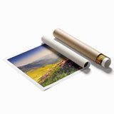 Colorful wall art print depicting serene mountain landscapes, featuring vibrant blues and greens, designed for home decor. Ideal for nature lovers and interior design enthusiasts, this rolled print is showcased in a protective cardboard tube.