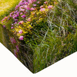 Close-up of a stretched canvas wall art piece showcasing a vibrant mountain landscape design, featuring rich colors and intricate details that enhance any modern decor.