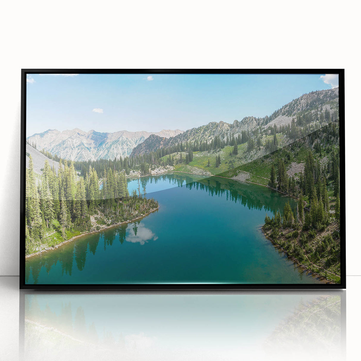 Framed acrylic wall art featuring a stunning mountain landscape design with rich colors, set against a sleek black frame, perfect for home decor or office ambiance.
