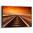 Framed canvas wall art depicting a serene landscape with railroads, showcasing a black frame and a side view that emphasizes its artistic design, ideal for modern decor.