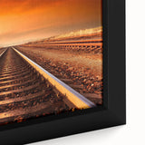 Framed canvas artwork showcasing a vibrant railroad landscape design, highlighting intricate details in colors of blue, green, and gold, perfect for modern decor.