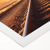 Rolled canvas artwork showcasing a vibrant railroad landscape design, perfect for home decor. The piece features rich colors and intricate details, ideal for art enthusiasts.