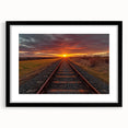 Framed landscape wall art depicting a scenic railroad design, featuring a black frame and mat, ideal for enhancing home decor with vintage charm.