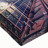 Close-up of a stretched canvas wall art piece depicting a vibrant railroad landscape, featuring bold colors and intricate details, ideal for home decor.