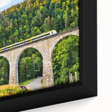Framed canvas artwork showcasing a vibrant landscape with railroads, featuring rich colors and intricate details, ideal for enhancing home decor or office spaces.