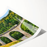 Vibrant rolled print showcasing a scenic landscape with railroad tracks, ideal for home decor. Features rich colors and detailed textures, perfect for art enthusiasts.