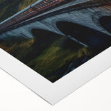 Rolled canvas wall art collection featuring a vibrant landscape with railroad tracks, showcasing rich colors and a serene atmosphere, ideal for enhancing home decor.