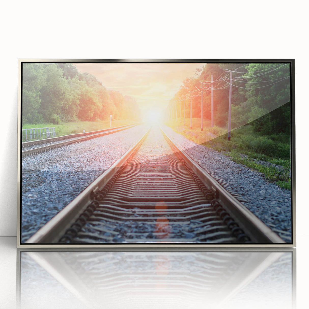 Framed acrylic wall art showcasing a stunning railroad landscape design with silver accents, perfect for enhancing home decor and creating a modern ambiance.