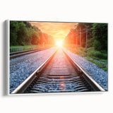 Framed canvas wall art featuring a scenic landscape with railroad tracks and lush greenery, presented in a sleek white frame, perfect for modern home decor.