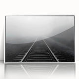 Framed wall art collection showcasing serene landscapes and railroads, presented in a sleek white frame, ideal for enhancing modern home decor.