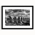 Framed black wall art featuring a scenic railroad landscape design, showcasing vibrant colors and intricate details, perfect for enhancing home decor.
