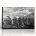 Framed acrylic wall art featuring a railroad landscape design, presented in a sleek black frame, perfect for enhancing home decor with a modern touch.