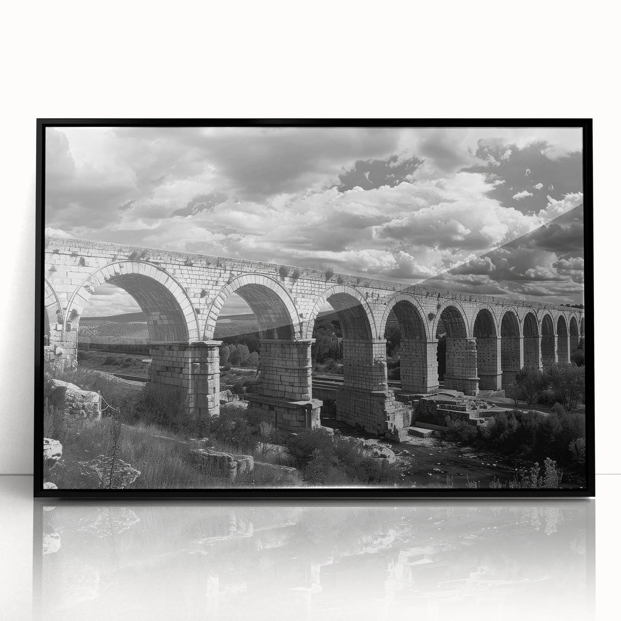 Framed acrylic wall art featuring a railroad landscape design, presented in a sleek black frame, perfect for enhancing home decor with a modern touch.