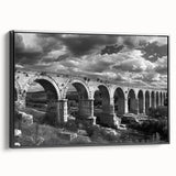 Framed canvas wall art collection titled "Landscapes and Railroads," featuring a vibrant black frame, showcasing a scenic railroad landscape design in a modern setting.