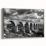 Framed canvas wall art depicting a scenic landscape with a railroad, featuring silver accents and a modern design, ideal for enhancing home or office decor.