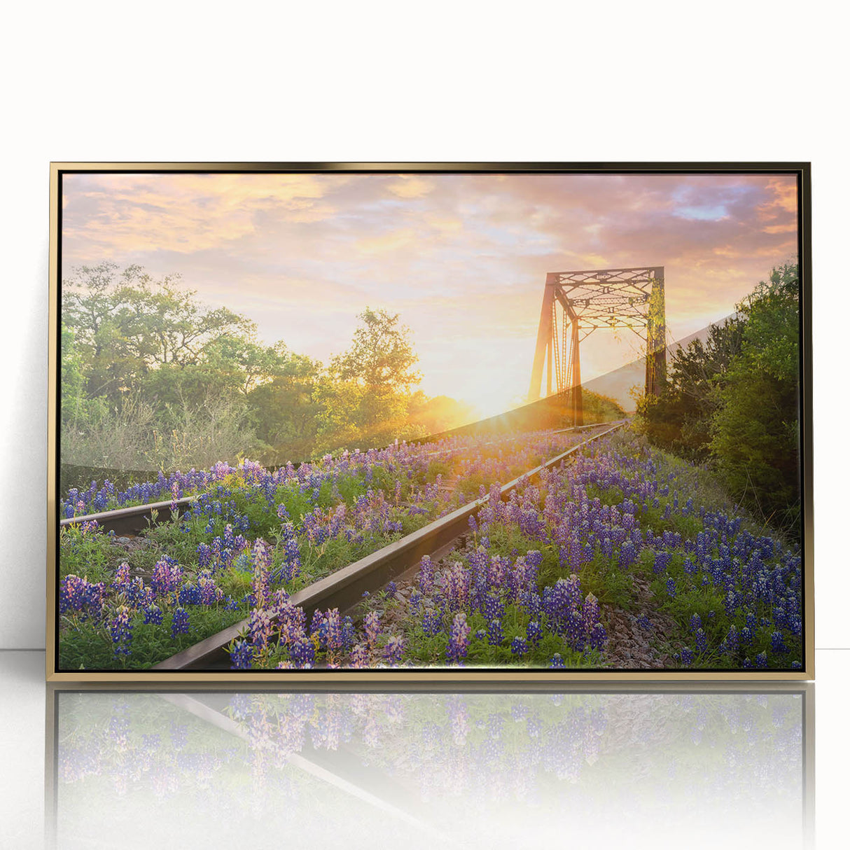 Framed acrylic wall art showcasing a vibrant railroad landscape design in gold tones, perfect for adding elegance to modern home decor. Ideal for art enthusiasts.