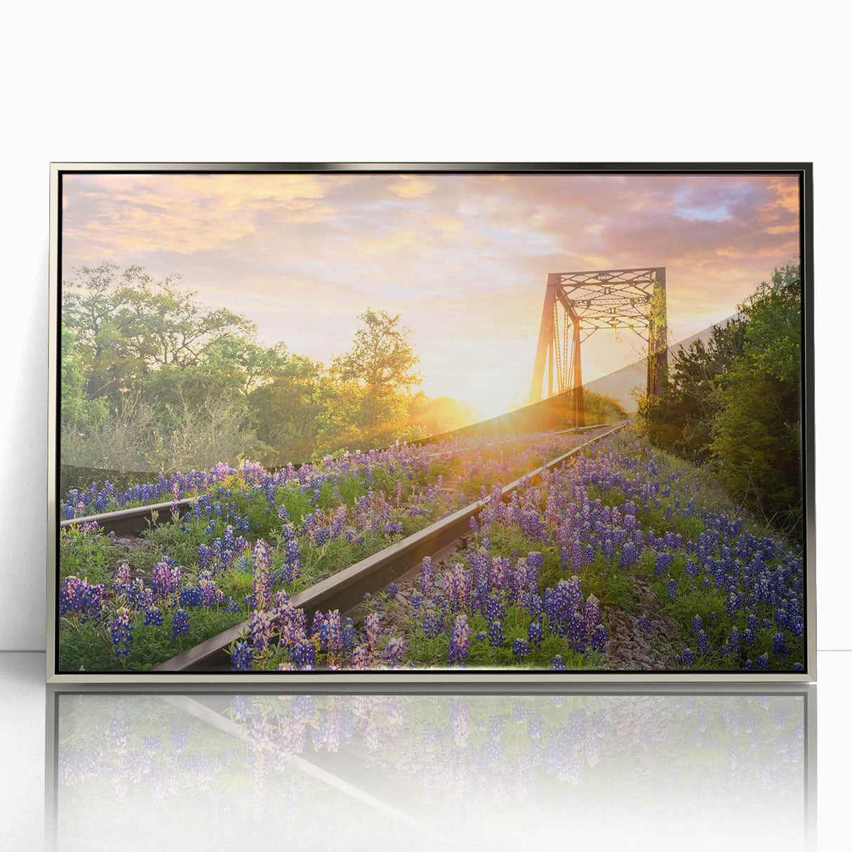Framed acrylic wall art showcasing a vibrant railroad landscape design with silver accents, ideal for modern home decor and art enthusiasts.