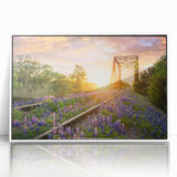 Framed wall art collection featuring a serene landscape with railroads, presented in a sleek white frame, ideal for modern home decor.