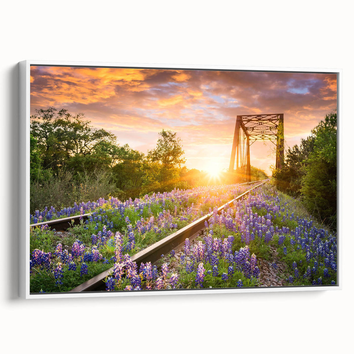 Framed canvas wall art showcasing a serene landscape with railroad tracks, featuring soft colors and a peaceful ambiance, ideal for home decor.
