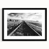 Framed wall art featuring a scenic railroad landscape design with a black matte frame, perfect for home decor, enhancing living spaces with a touch of nature.