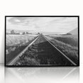 Framed acrylic wall art showcasing a vibrant landscape with railroads, featuring a sleek black frame. Ideal for modern home decor, adding depth and color to any space.