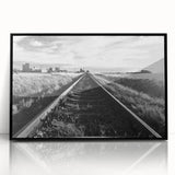 Framed acrylic wall art showcasing a vibrant landscape with railroads, featuring a sleek black frame. Ideal for modern home decor, adding depth and color to any space.
