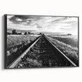 Framed canvas wall art showcasing a black and white railroad landscape design, highlighting intricate details and textures, perfect for modern home decor.