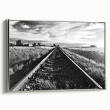 Framed canvas wall art showcasing a scenic landscape with railroads, featuring a silver frame, perfect for enhancing modern home decor. This artistic piece highlights the beauty of railroads amidst nature, ideal for living rooms or offices.