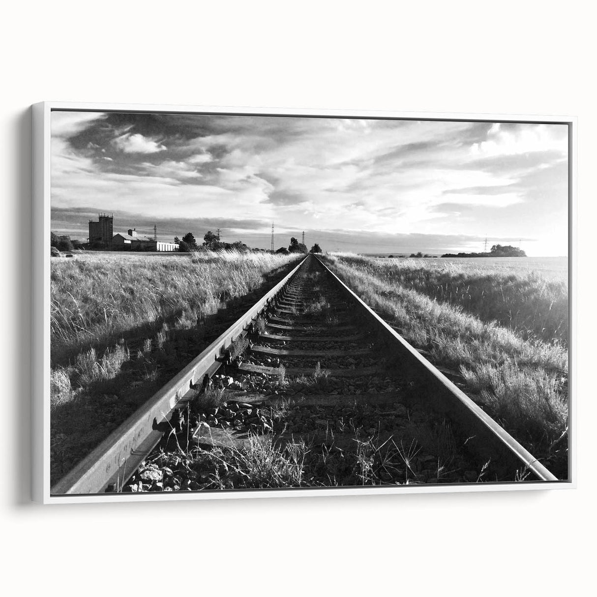 Framed canvas wall art showcasing a serene landscape with railroads, featuring vibrant colors and a modern design, ideal for enhancing home décor aesthetics.