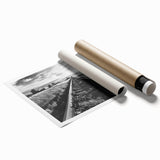 Rolled print of a stunning railroad landscape design showcasing vibrant colors and intricate details, ideal for home decor, packaged securely in a protective tube.