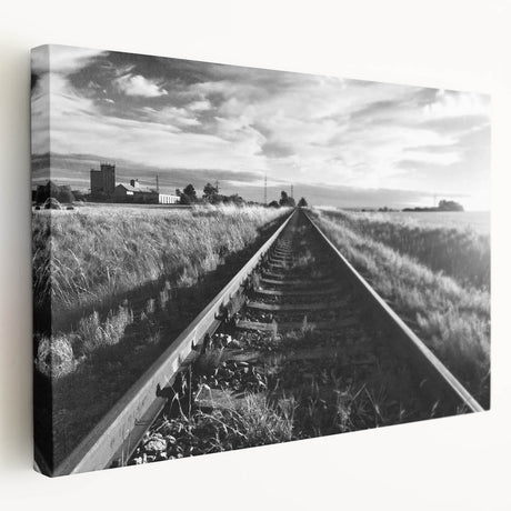 Stretched canvas wall art depicting a vibrant landscape with railroads, showcasing rich colors and intricate details, designed to enhance home decor.