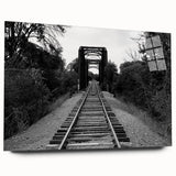 Acrylic glass wall art piece showcasing a vibrant railroad landscape design, featuring rich colors and intricate details, elegantly displayed in a side view without pins. Perfect for enhancing modern interior decor.