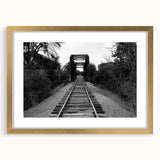 Framed wall art showcasing a vibrant railroad landscape design, featuring gold accents and a matte finish, perfect for enhancing home decor with an artistic touch.