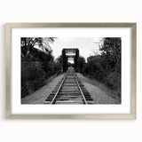 Framed wall art showcasing a stunning railroad landscape design in a silver frame with a mat, perfect for enhancing modern home decor. The artwork features vibrant colors and intricate details, ideal for enthusiasts of train history and scenic landscapes.