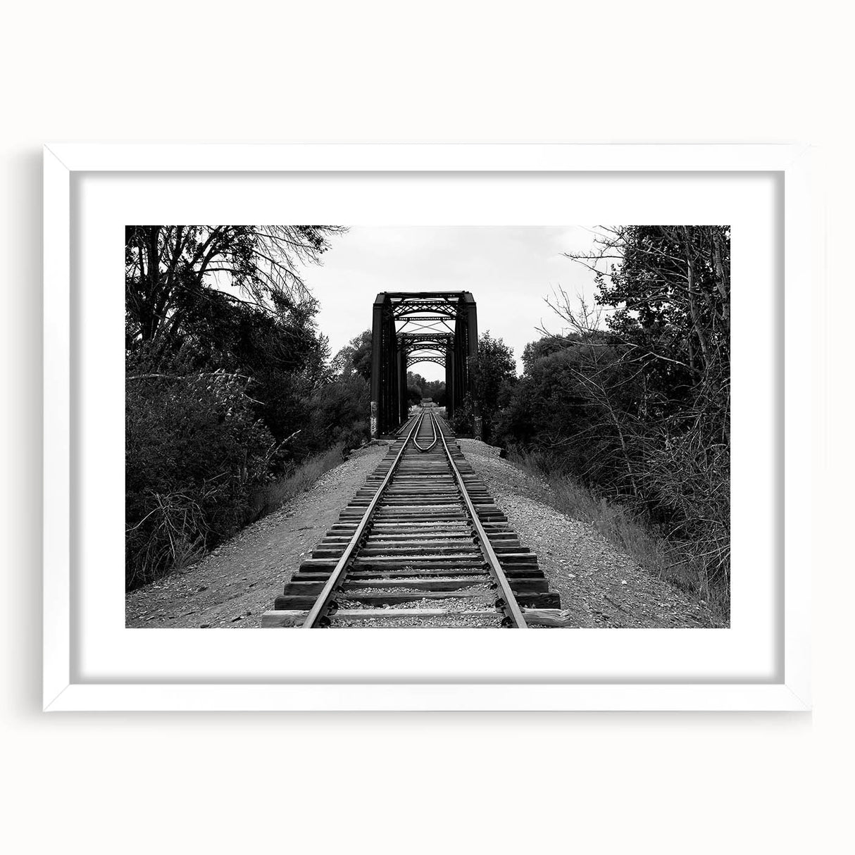 Framed white mat wall art showcasing a scenic railroad landscape, emphasizing vibrant colors and intricate details, perfect for home decor enthusiasts.