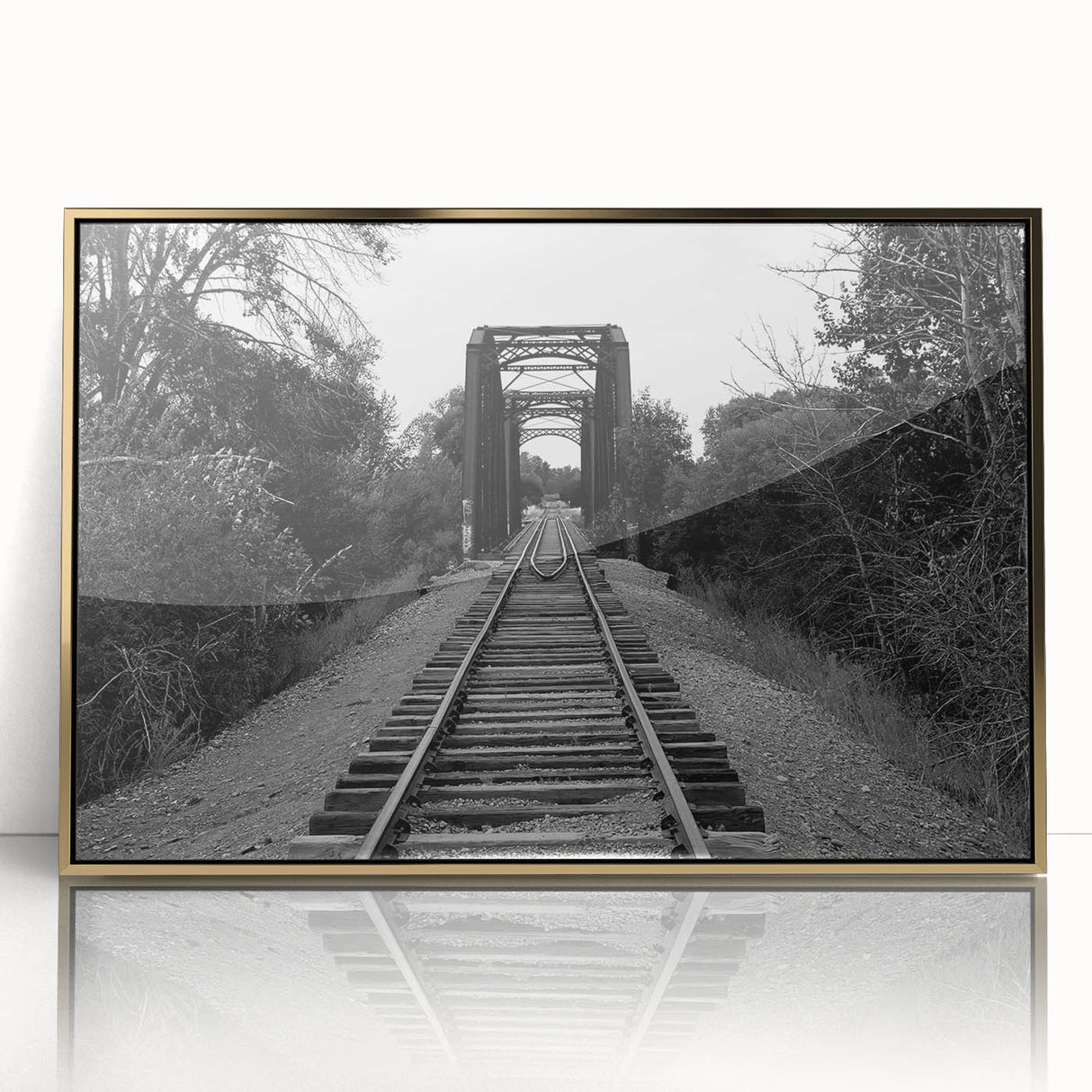 Framed wall art featuring an abstract landscape design with railroad tracks, set against a golden backdrop. This elegant piece enhances modern decor with its vibrant colors and intricate details, perfect for art enthusiasts.